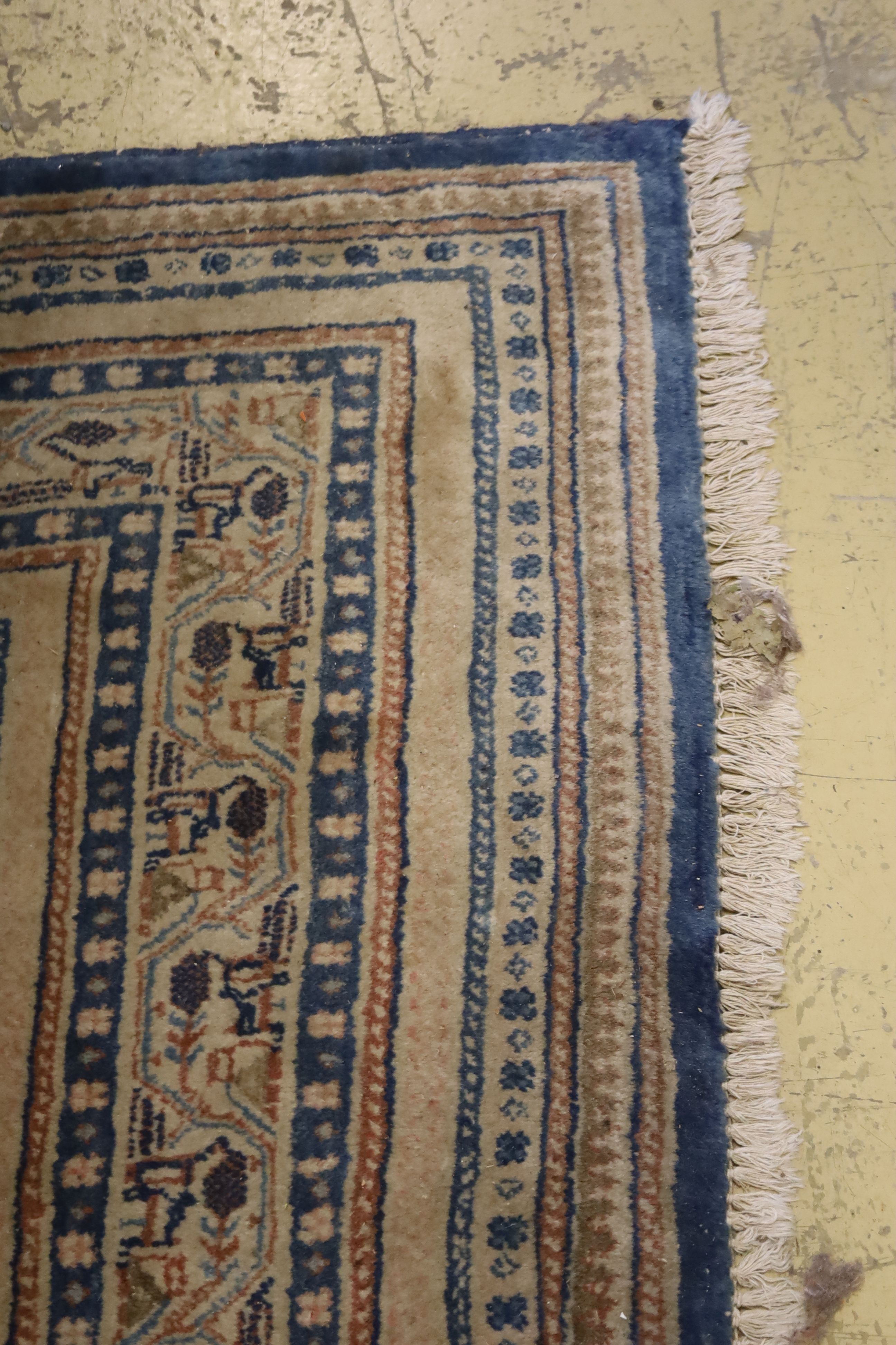 A Tabriz blue ground carpet